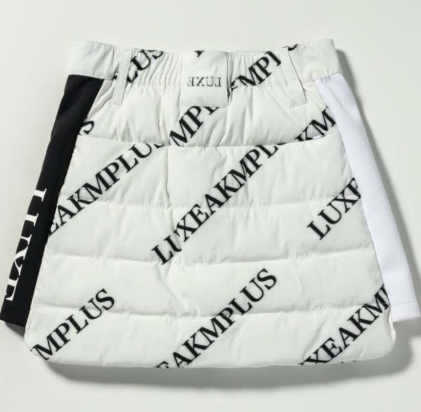 【新品】LUXEAKMPLUS ゴルフ スカート 中綿サイドロゴ 白×黒 L