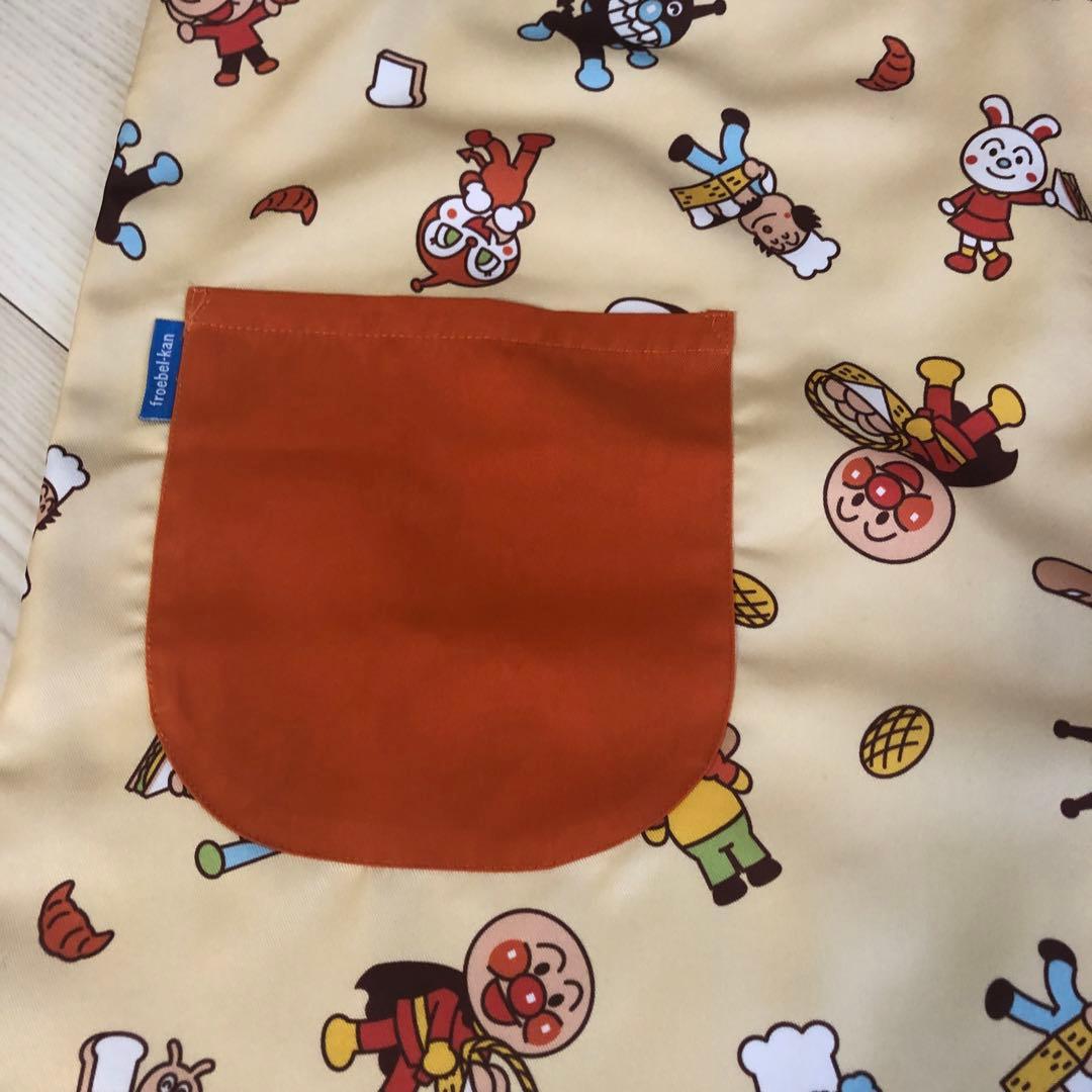 アンパンマン エプロン クリーム色　パンをおととどけ　フレーベル館