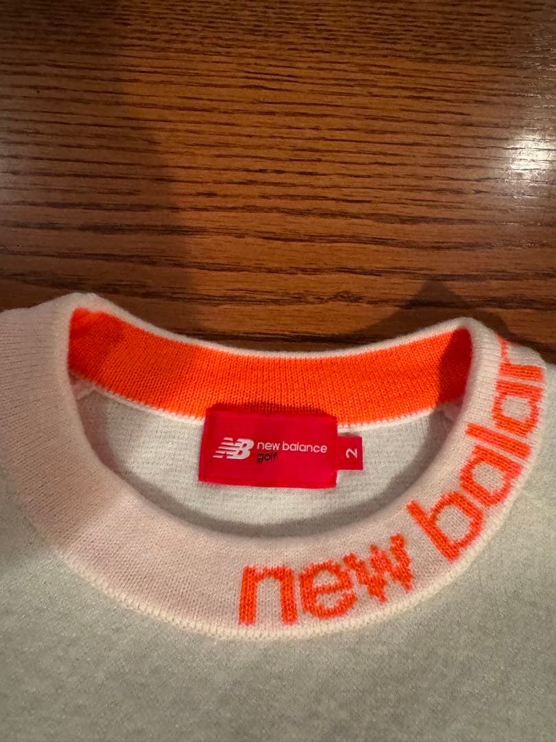 New Balance ニットセーター イエロー/ホワイト