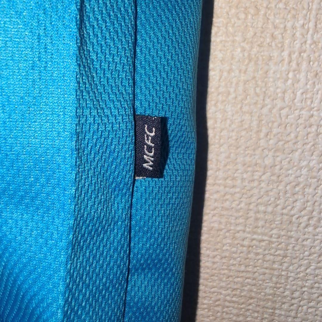 マンチェスターシティ　le coq sportif