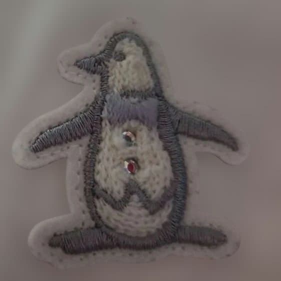 マンシングウェア ホワイトダウンベスト ペンギン刺繍付き