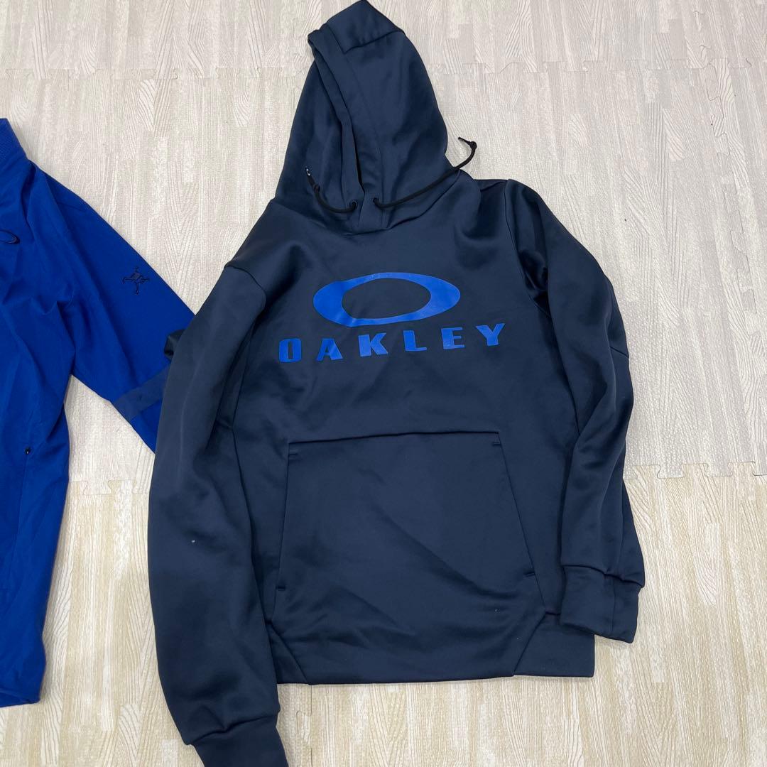 Oakley 青色ジャケットM パーカー L