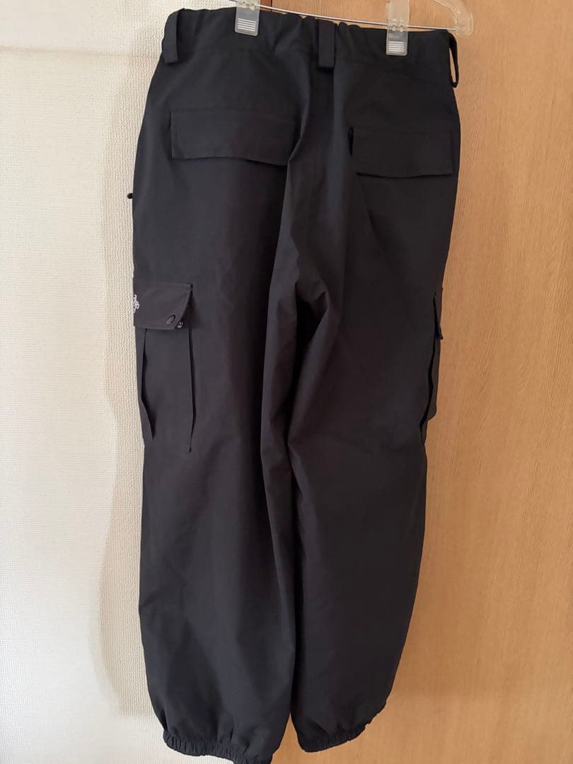 NOMADIK 777 パンツ black XL 22-23