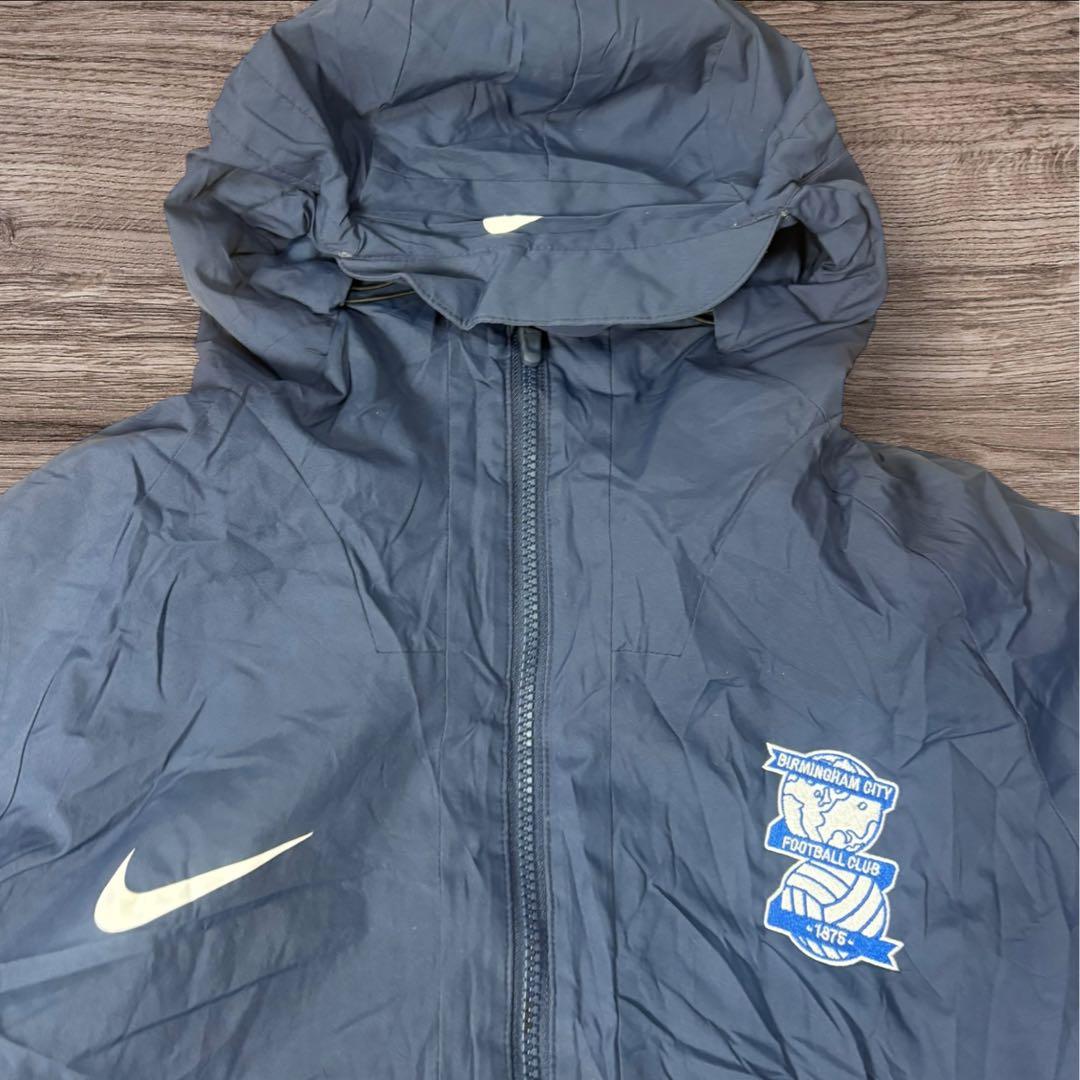 NIKEナイキバーミンガムFC 中綿ベンチコート L 紺刺繍ロング丈