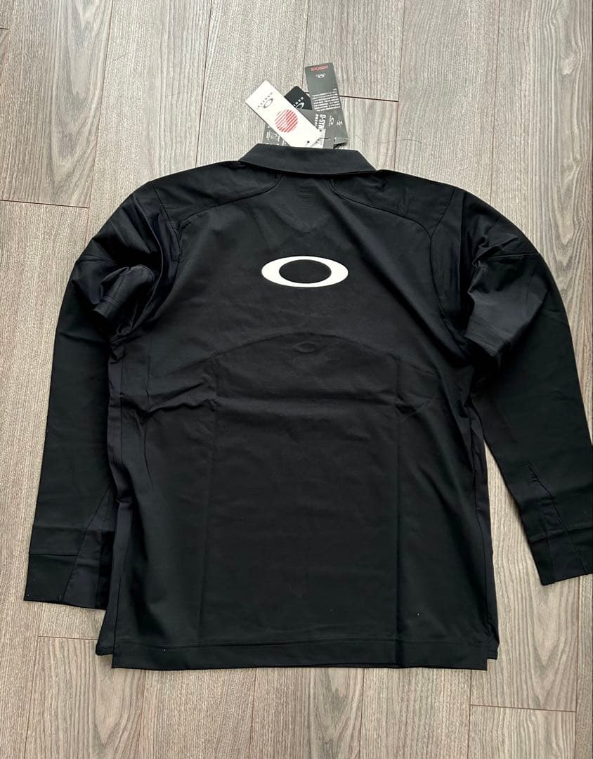 新品 OAKLEY オークリー 長袖ハーフジッププルオーバー UPF50速乾 L