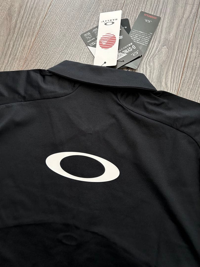 新品 OAKLEY オークリー 長袖ハーフジッププルオーバー UPF50速乾 L