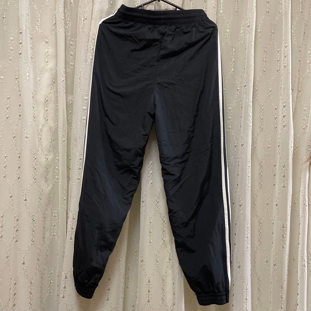 adidas アディカラーウーブンファイヤーバード トラックパンツIT2501