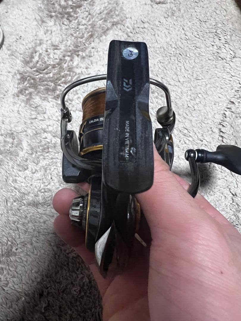 Daiwa スピニングリール 黒・金 カルディア3000XH