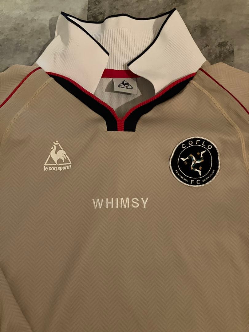 le coq sportif WHIMSY COFLO FC シャツ
