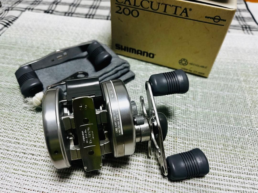 SHIMANO CALCUTTA 200 ベイトリール 替えハンドル1点、箱付き