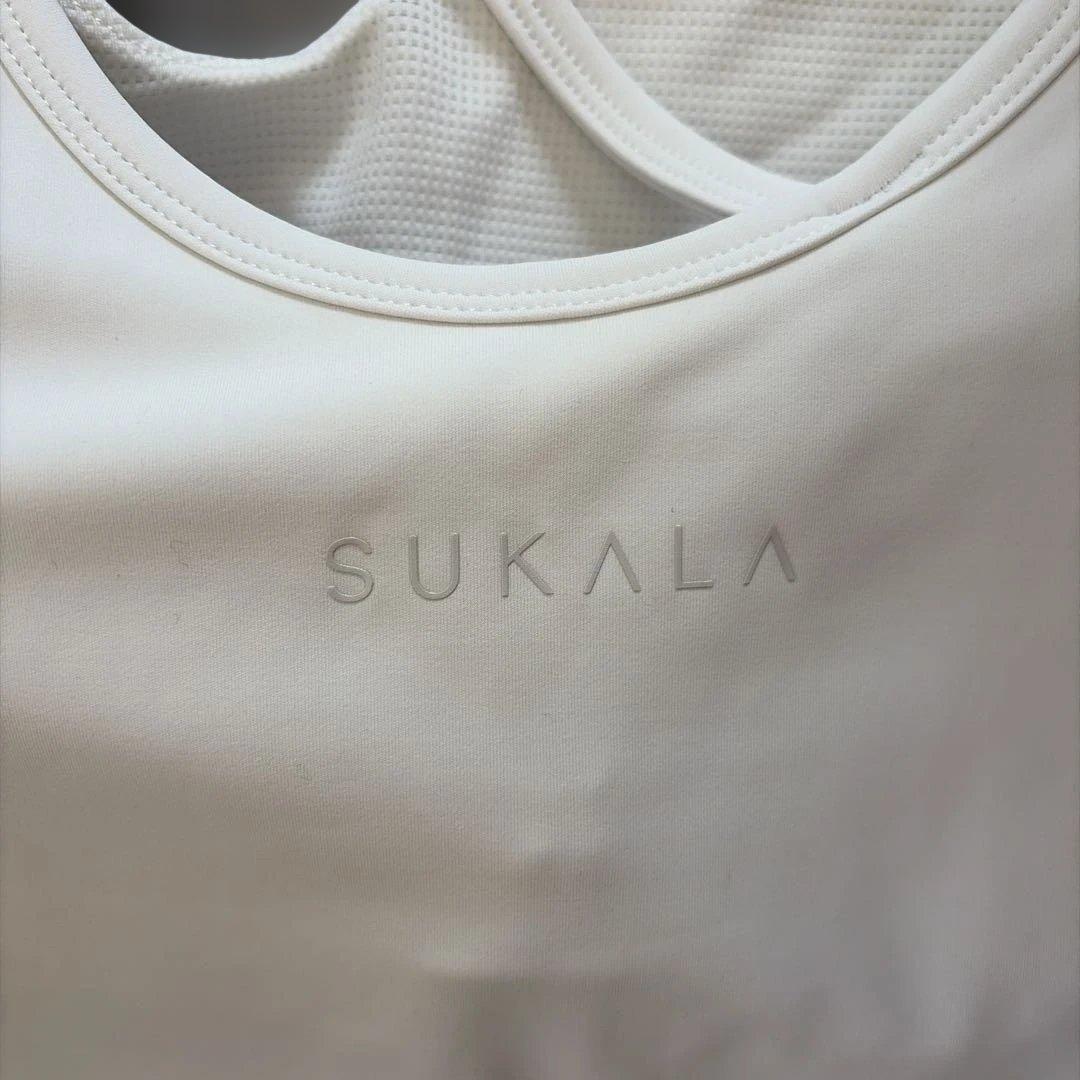 【SUKALA】カップ付きモダンカットアウトロングスリーブ