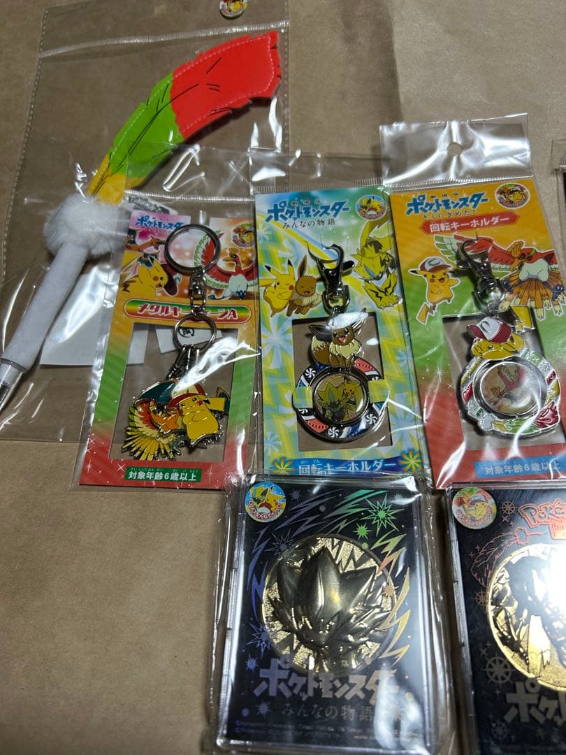 ポケモン 映画限定 グッズ 20周年記念劇場メダル ピンズ キーホルダー