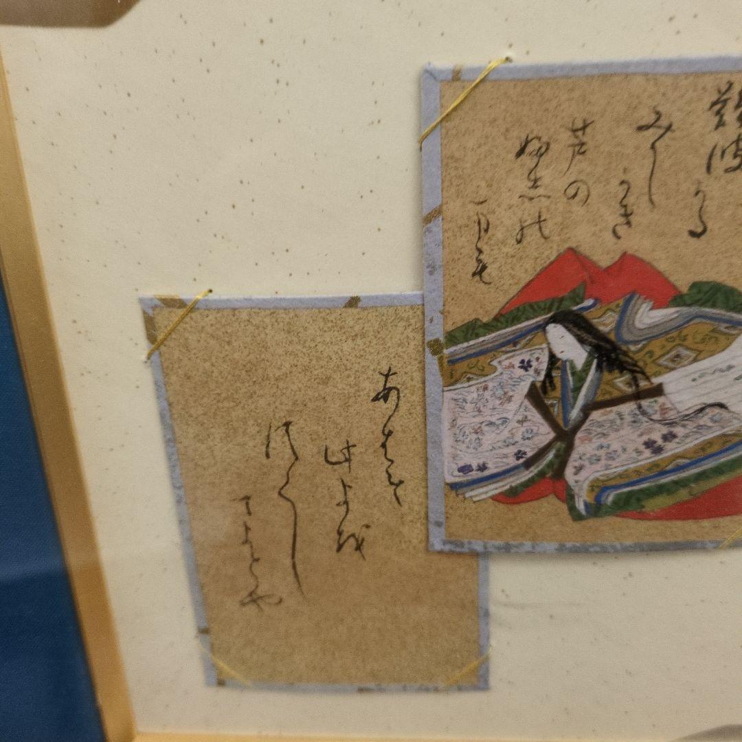 百人一首の古いカルタが読札と絵札のセットでマウントされています