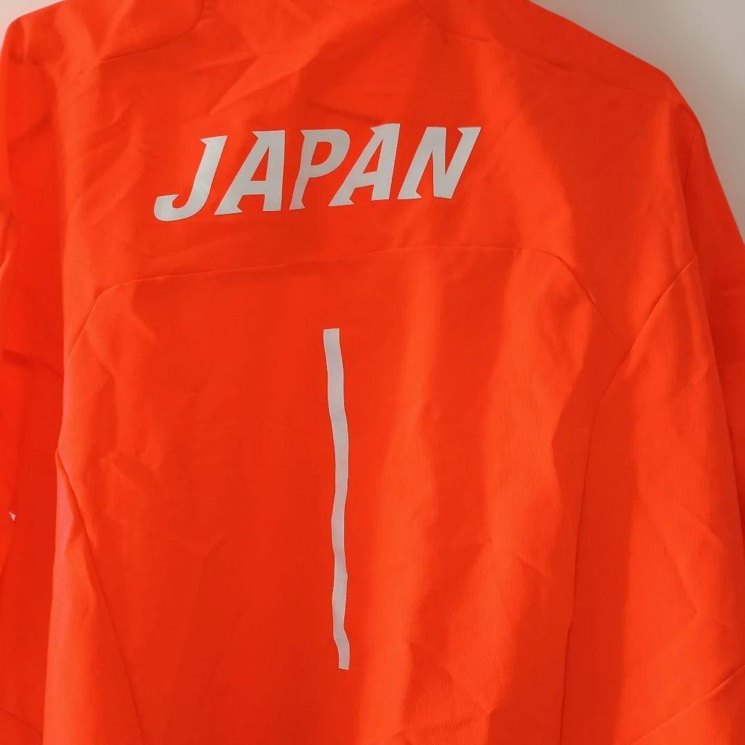 ASICS オレンジ ウィンドブレーカー L。 日本代表