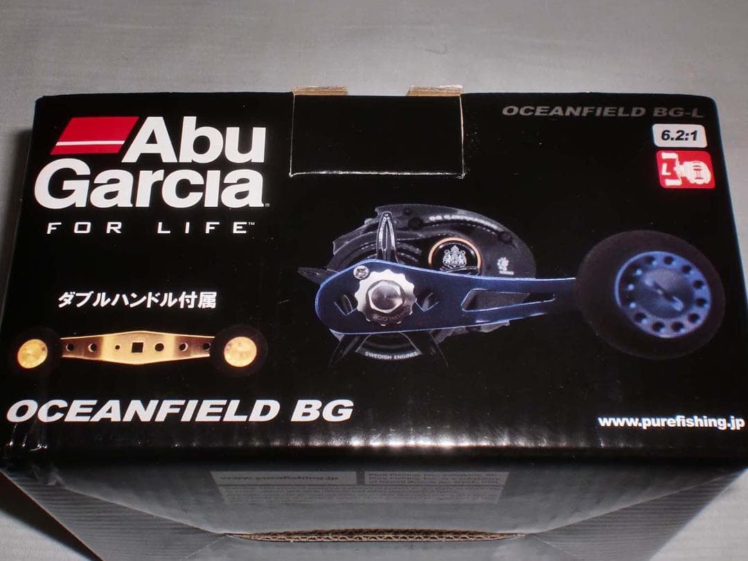 Ａｂｕ　オーシャンフィールドＢＧ【左巻】スペアハンドル付　新品（※箱折り目有り）