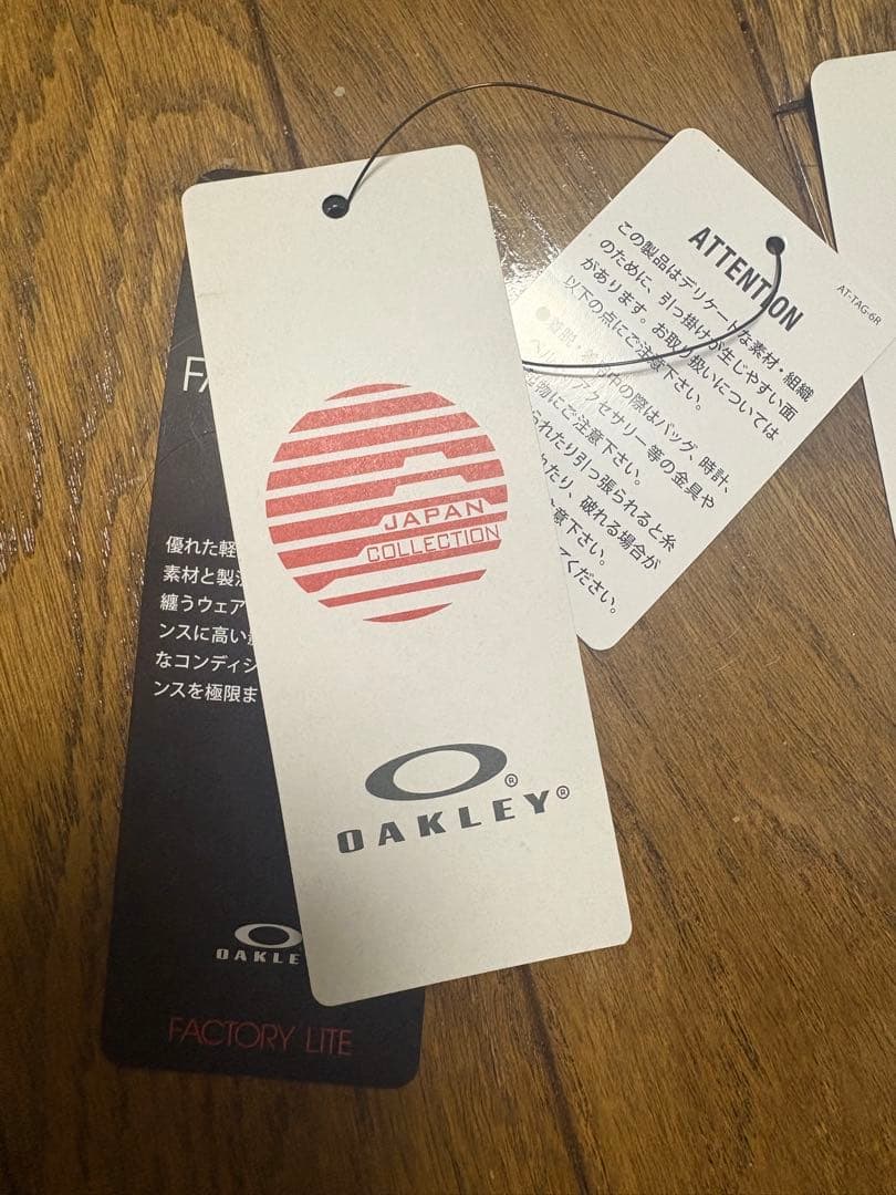 OAKLEY ゴルフウェア　ホワイト セーター JPN XL