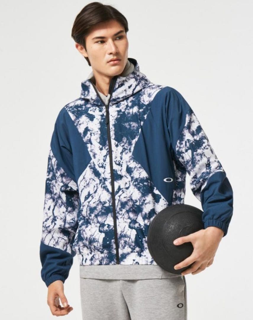 極美品 OAKLEY ENHANCE GRAPHIC WIND L 総柄 メンズ