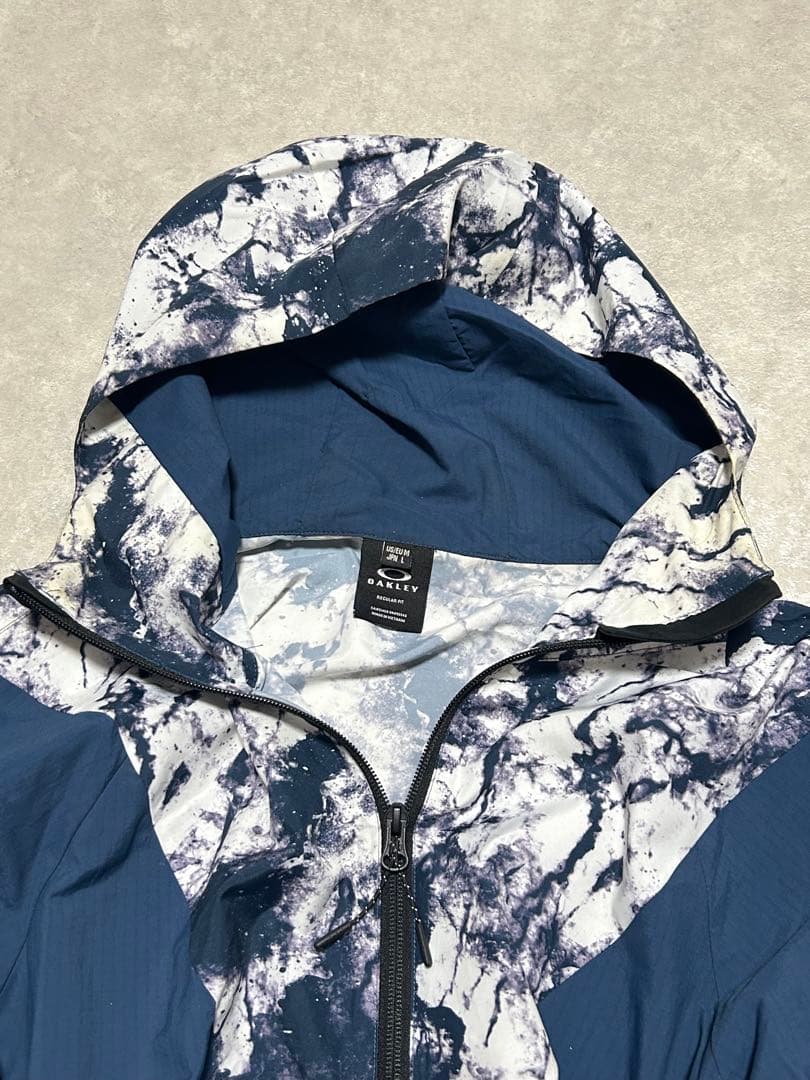 極美品 OAKLEY ENHANCE GRAPHIC WIND L 総柄 メンズ