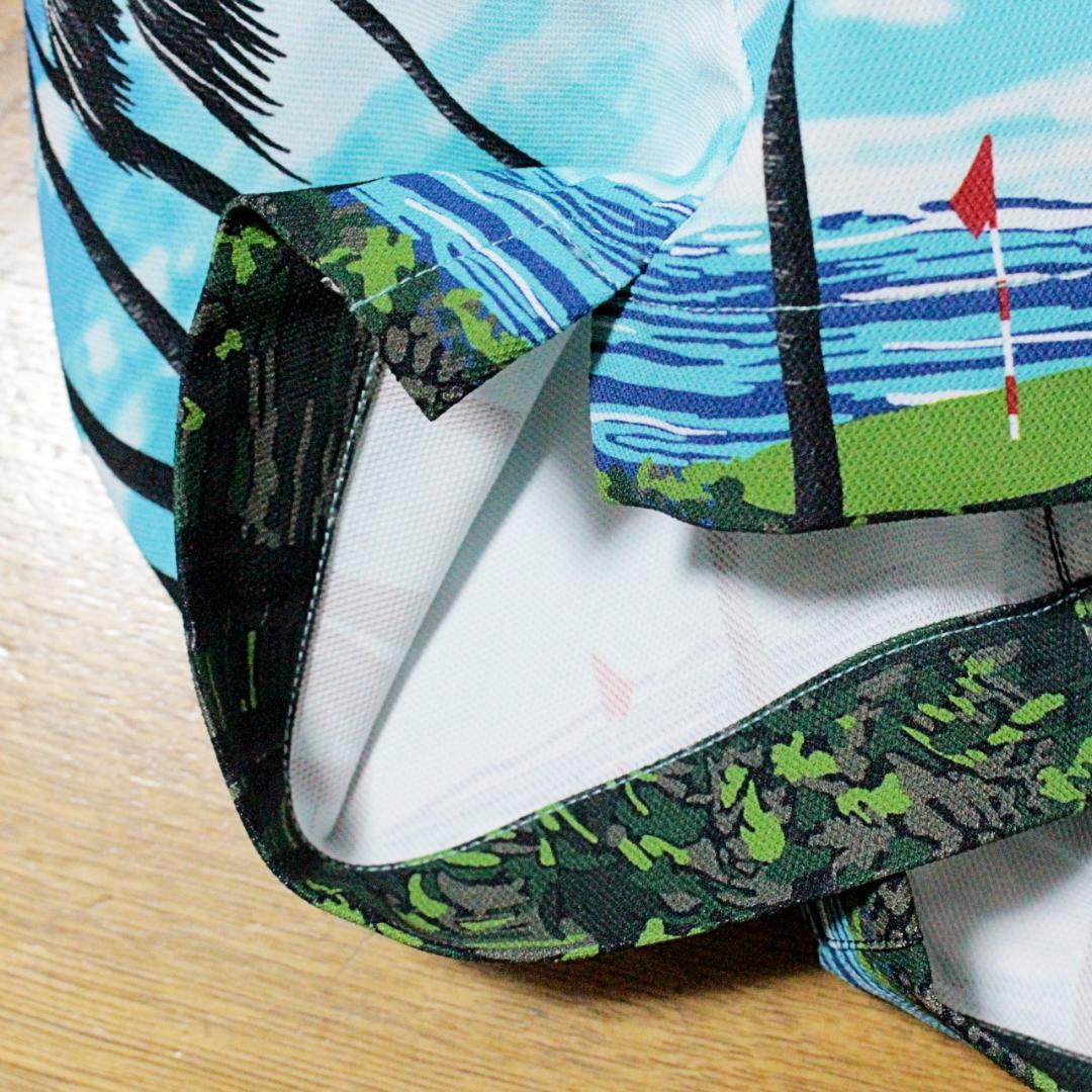 新品 パーリーゲイツ ヤシの木柄ストレッチハーフパンツ L（80-84cm）青空