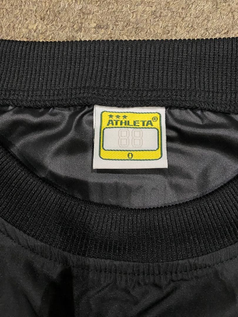 ATHLETA ピステ上下 黒/緑　サイズO