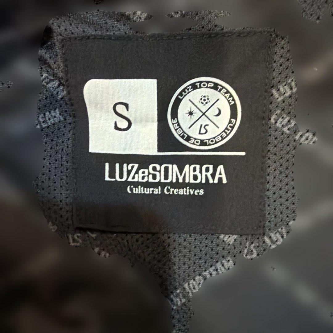 Luz Sombra LTTピステ・ウィンドブレーカー ブラック