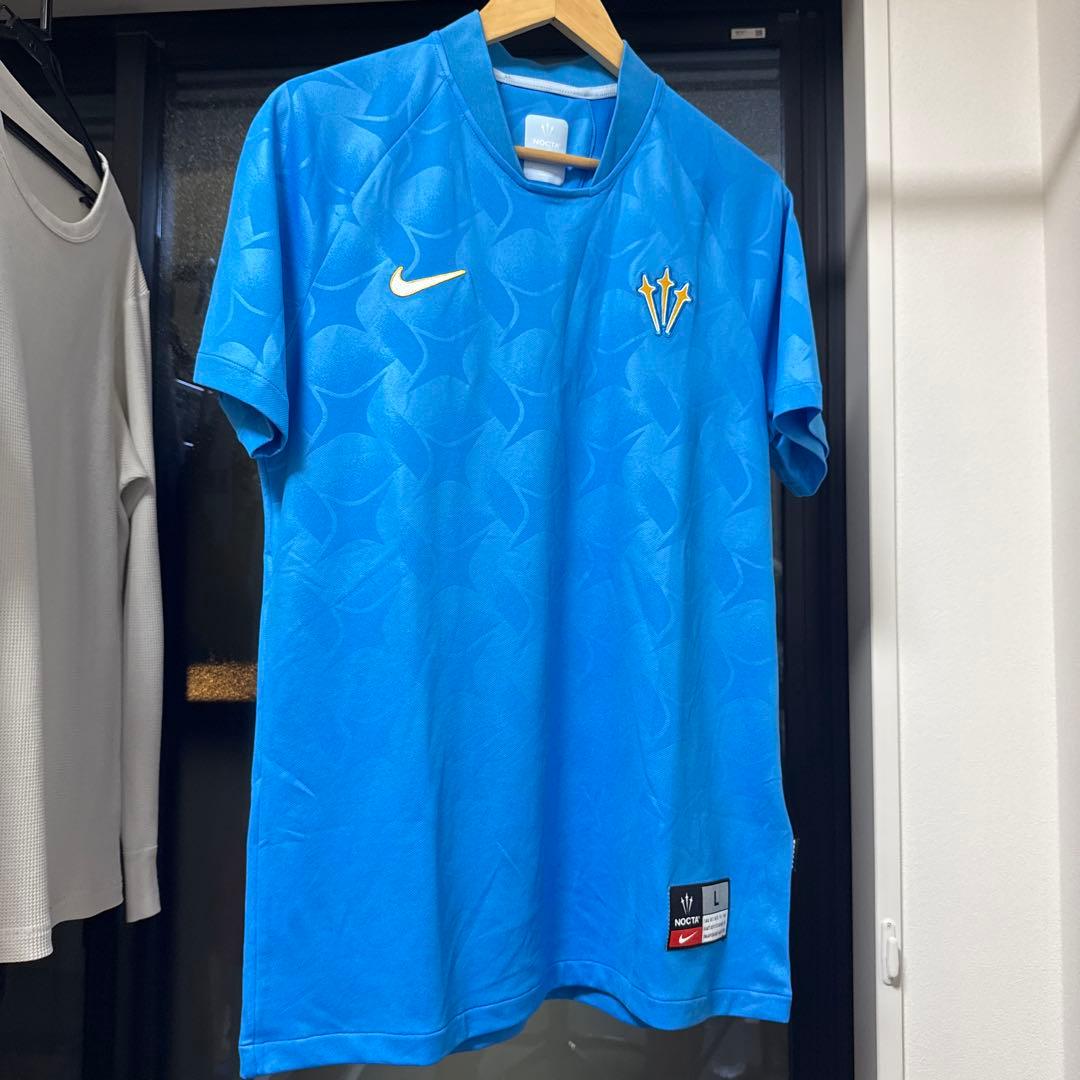 Nike NOCTA ライトブルーシャツ Lサイズ