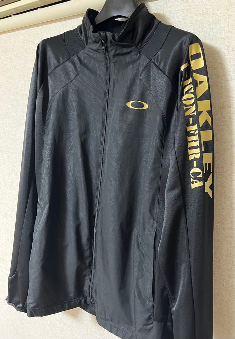 オークリー　ジャージ　上下セット　黒×金　XL