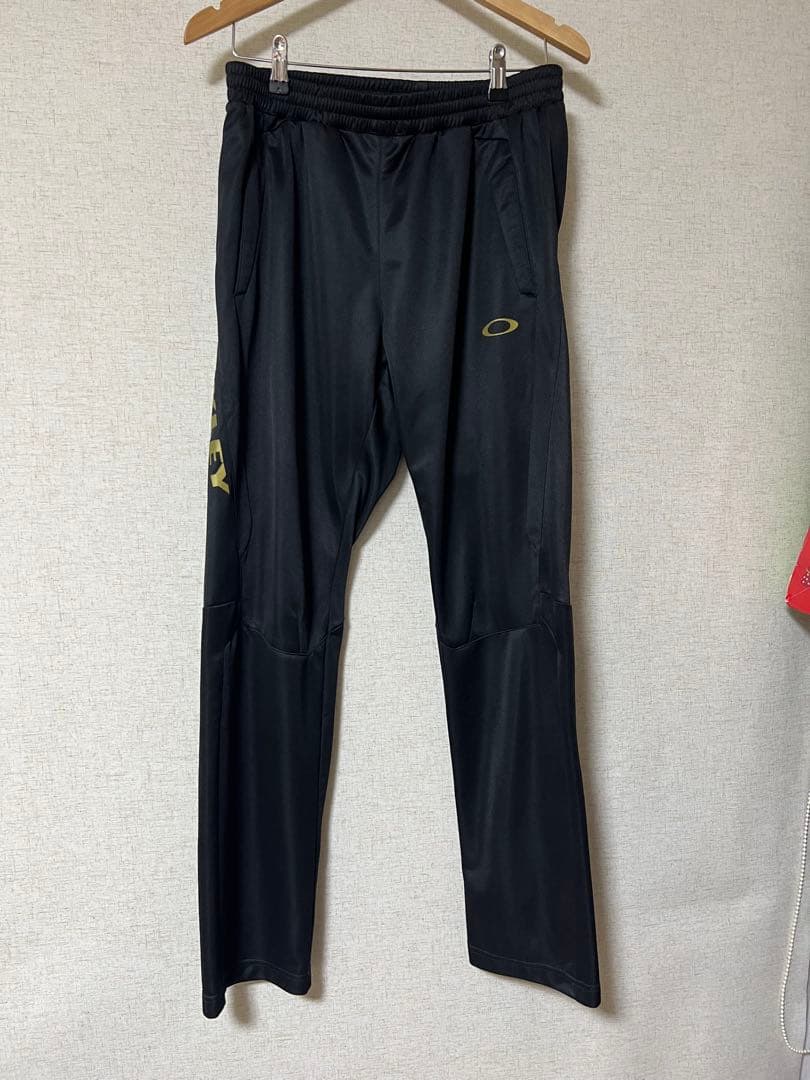オークリー　ジャージ　上下セット　黒×金　XL