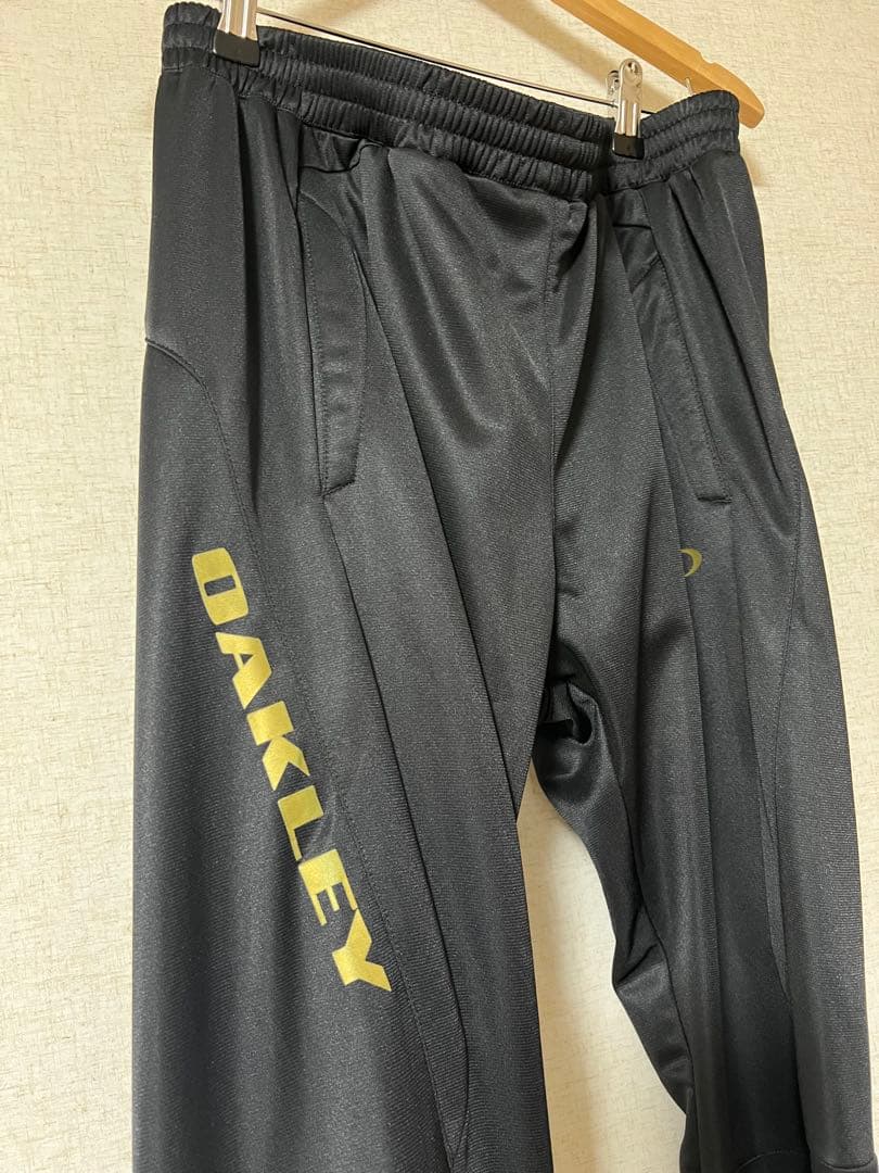 オークリー　ジャージ　上下セット　黒×金　XL