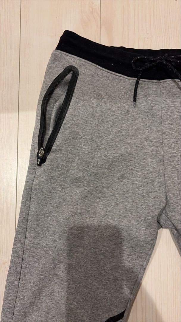 パーリーゲイツサイズ5グレー スリムフィットパンツ ジッパーポケット付き