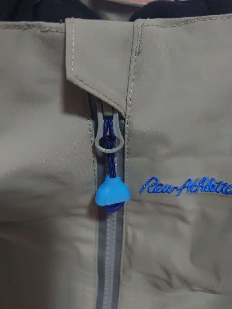 rew THE STRIDER JKT 19 カーキ/ホワイト