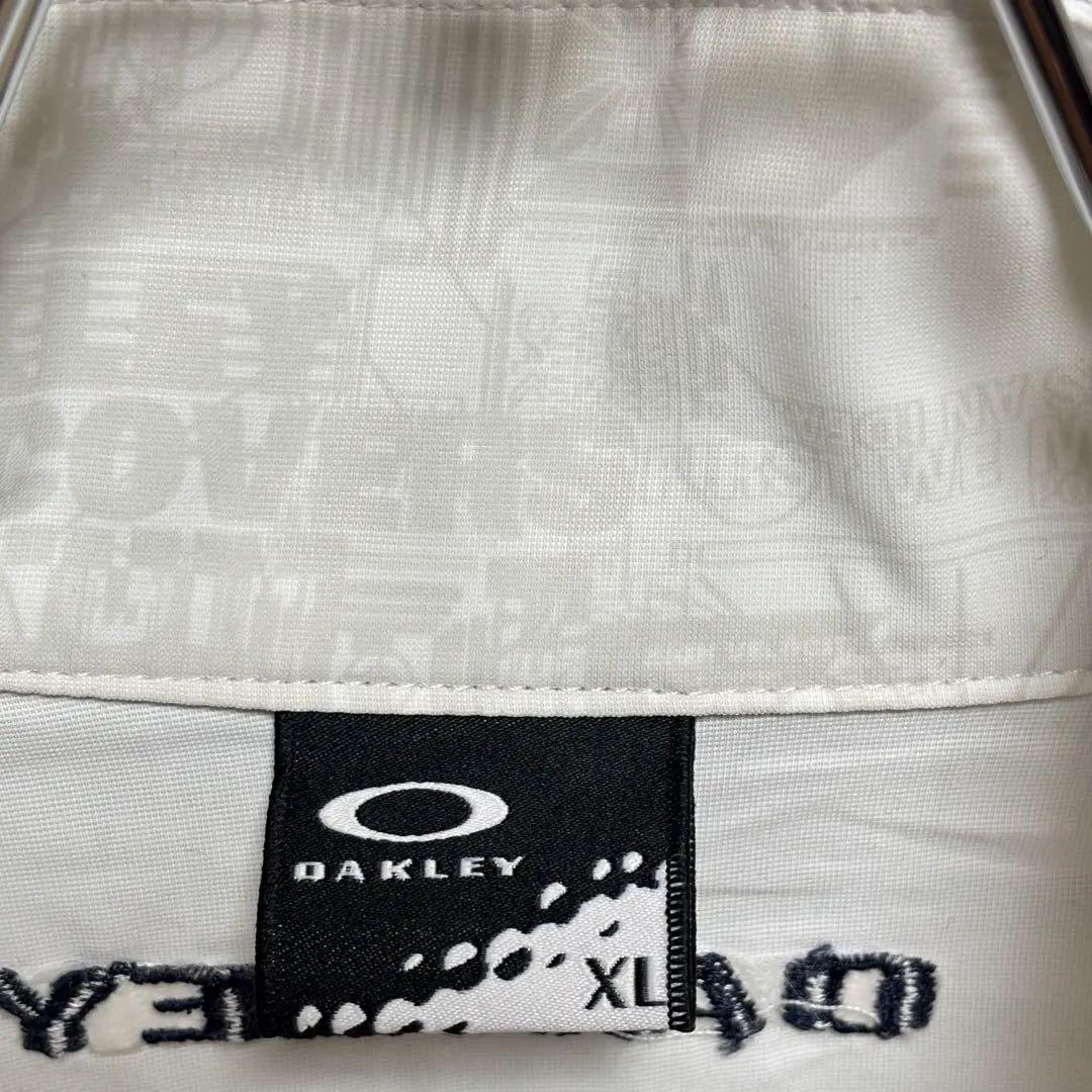 オークリー　OAKLEY ジャケット　ナイロン　総柄　刺繍ロゴ　ホワイト XL