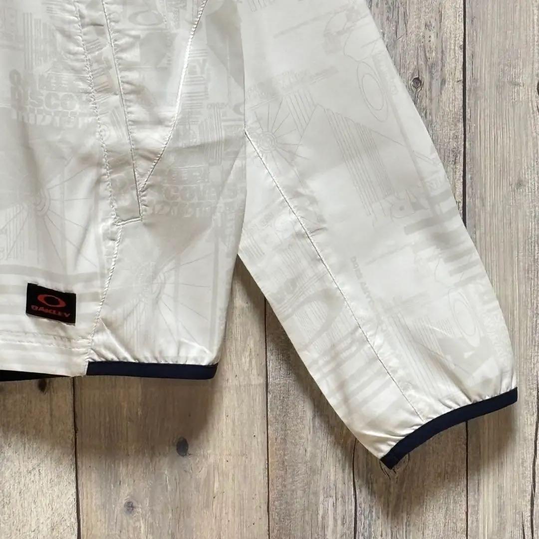 オークリー　OAKLEY ジャケット　ナイロン　総柄　刺繍ロゴ　ホワイト XL