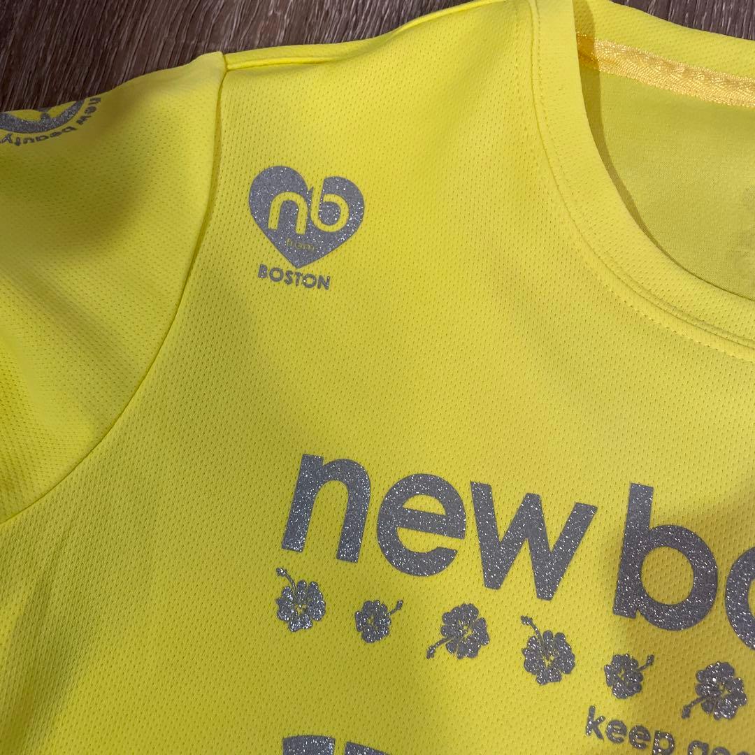 ホノルルマラソン限定　ハイビスカスnew balance イエロー トップス