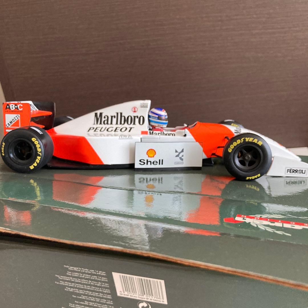 ミニカー Marlboro McLaren Peugeot MP4/9 1/18