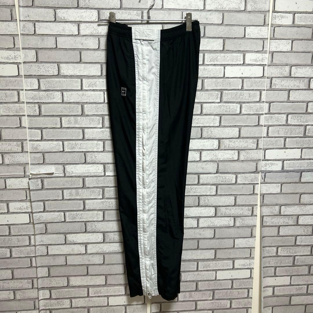 セール《美品》NIKE☆ナイキ☆ナイロンジャージ 刺繍ロゴ 側面チャック 黒/白