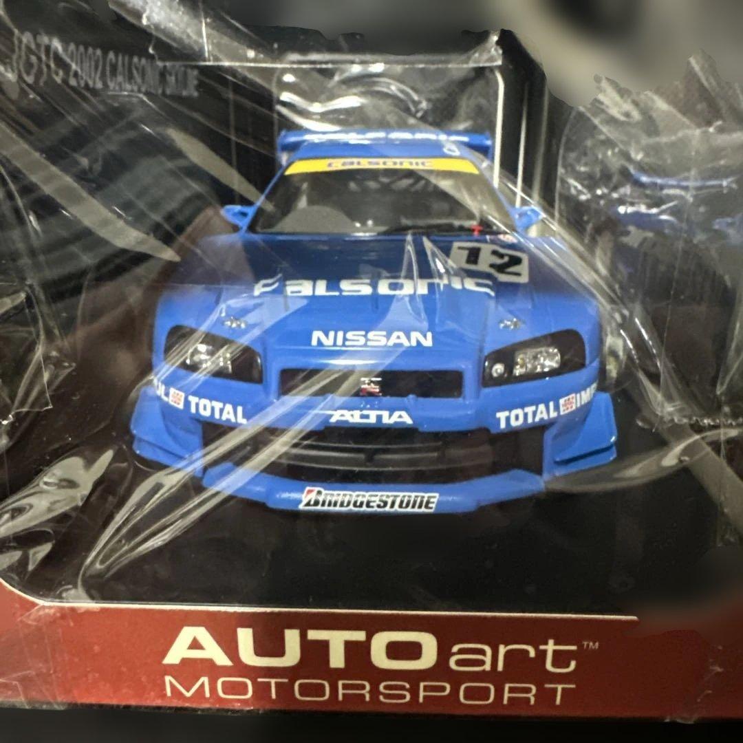 ミニカー AUTOart 2002 Calsonic Skyline 1/18