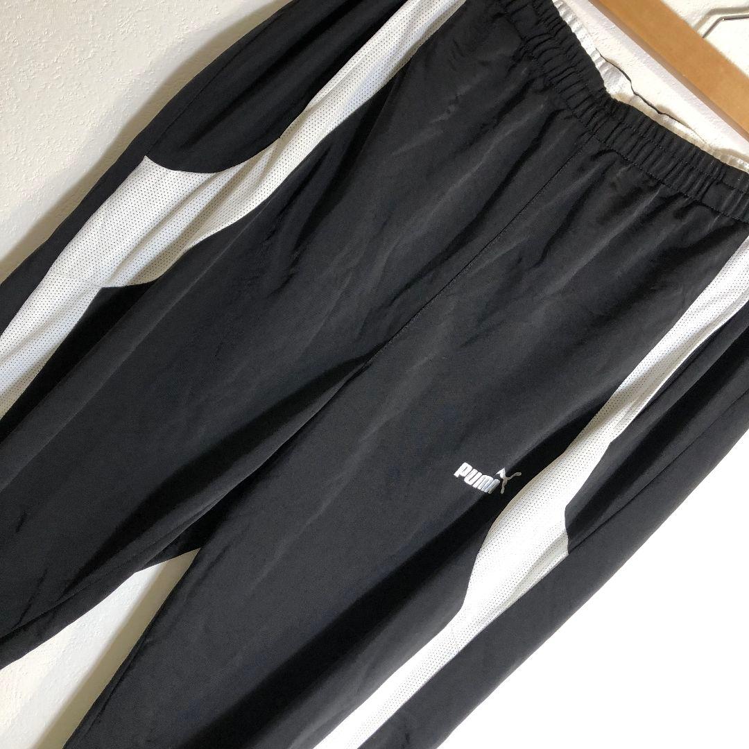 PUMA 黒サイドラインジャージパンツ L