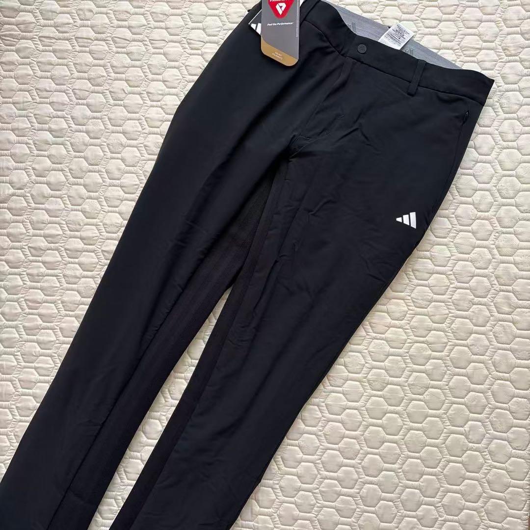 76新品27500円アディダスゴルフ/メンズ/秋冬/中綿ストレッチパンツ/黒