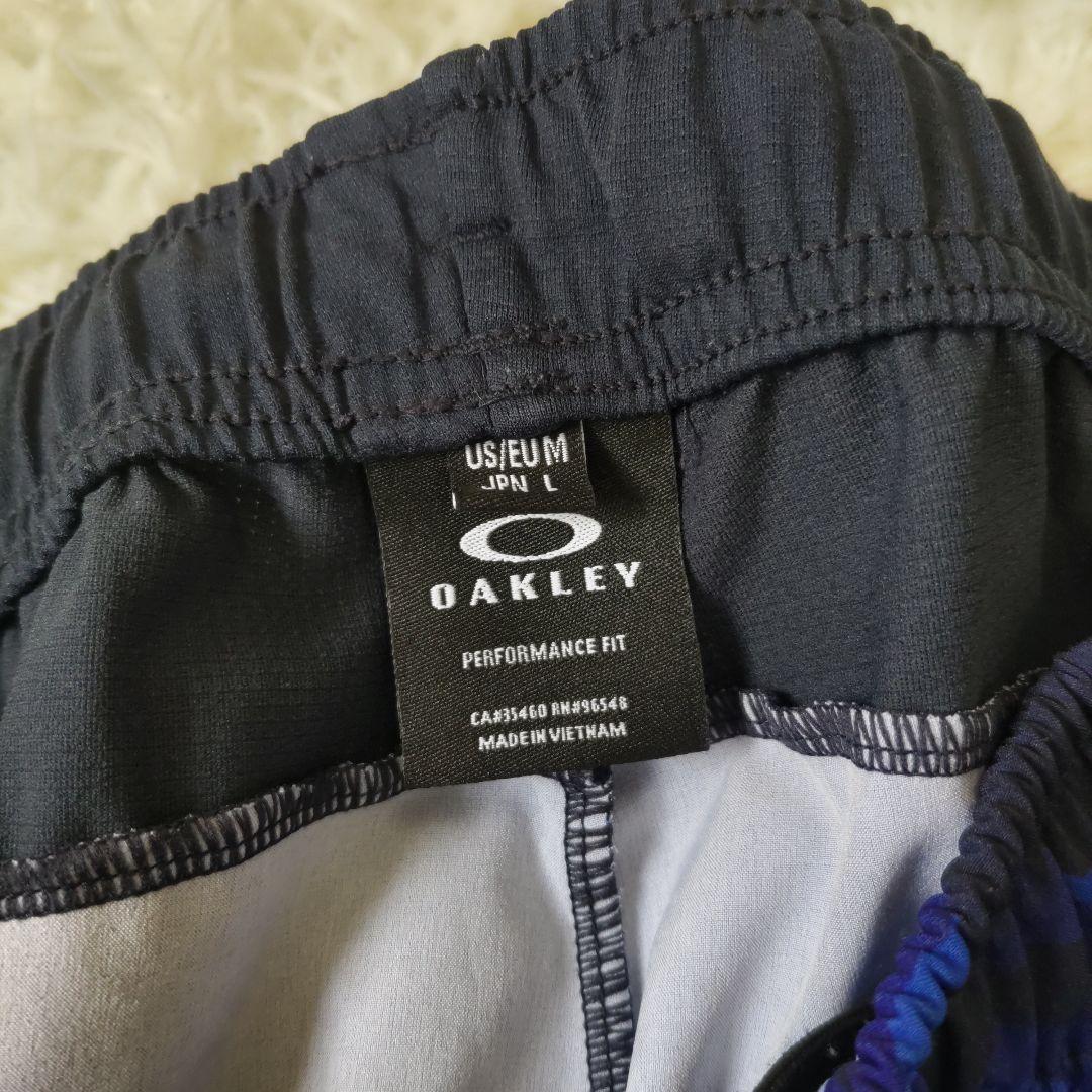 【ほぼ未使用】OAKLEY　STRIKE WIND　セットアップ　L　ブルー
