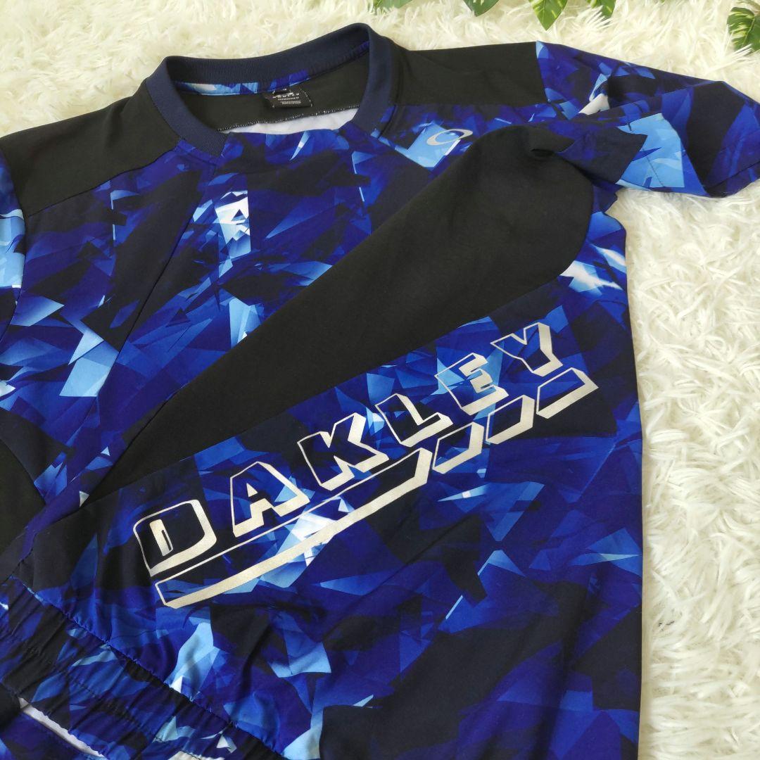 【ほぼ未使用】OAKLEY　STRIKE WIND　セットアップ　L　ブルー