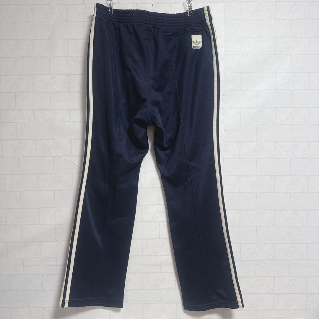 美品 アディダスオリジナルス トラックパンツ ネイビー M S-104
