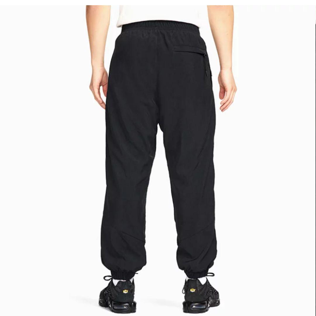 新品 NIKE ナイキ ナイロンウーブンパンツ 裏起毛