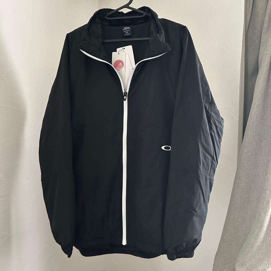 新品オークリー ENHANCE WIND WARM STAND JACKET