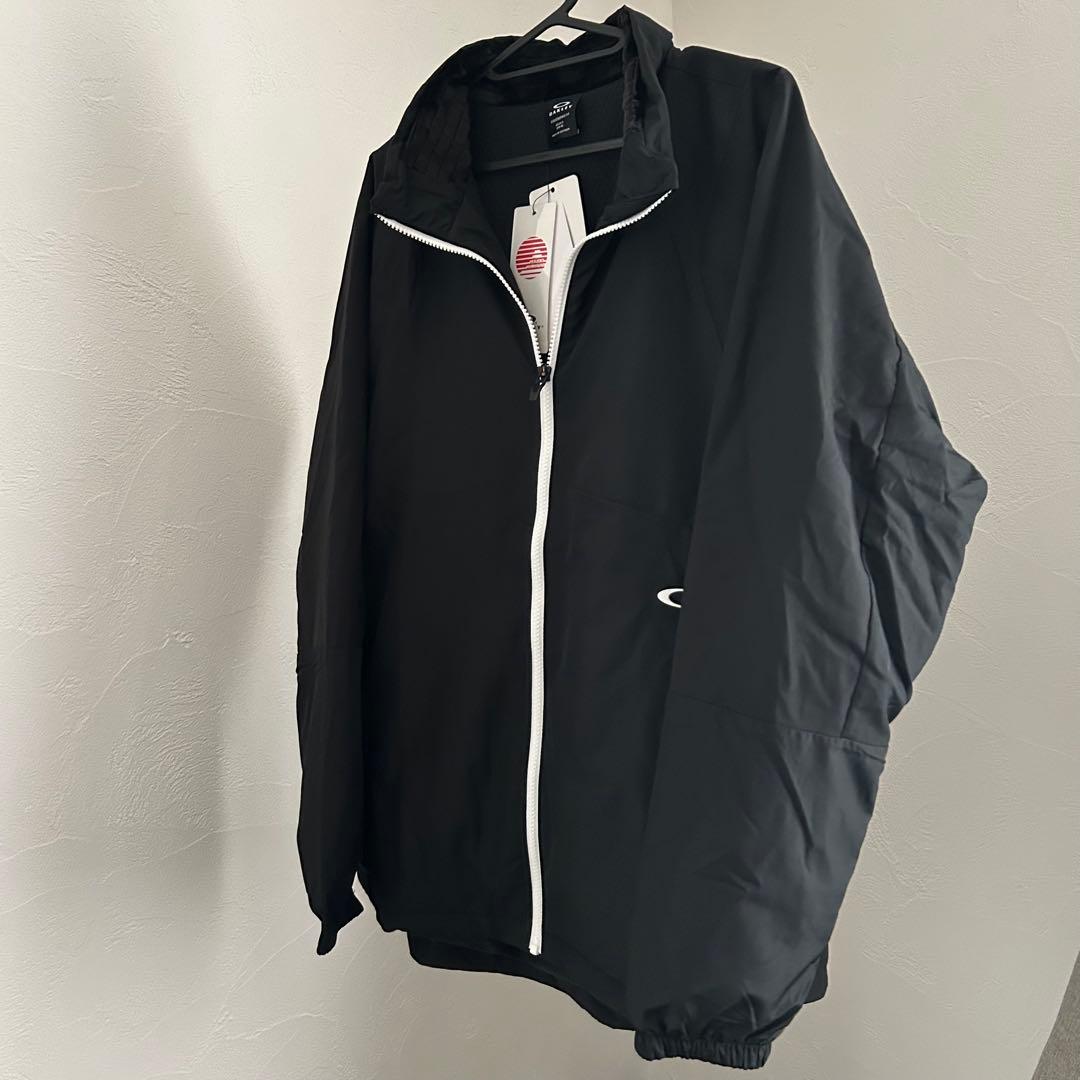 新品オークリー ENHANCE WIND WARM STAND JACKET