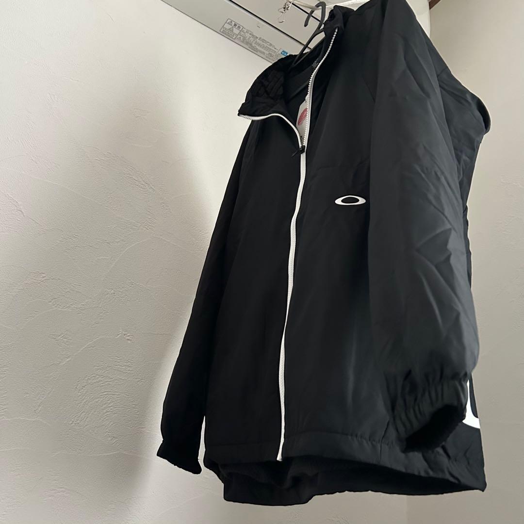 新品オークリー ENHANCE WIND WARM STAND JACKET