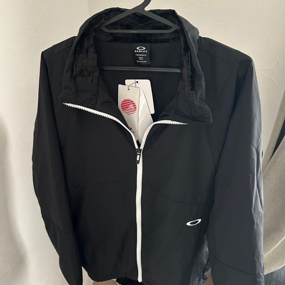 新品オークリー ENHANCE WIND WARM STAND JACKET