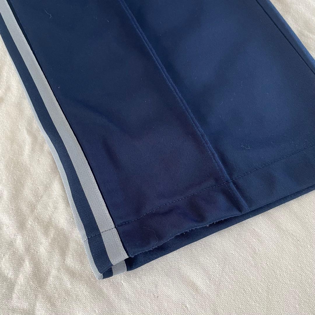 adidasアディカラー バギーフィット ファイヤーバードトラックパンツ