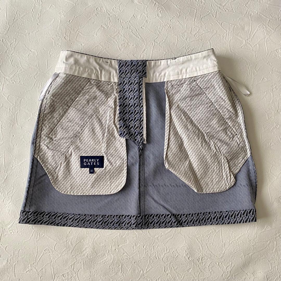 美品【パーリーゲイツ】ディズニーオズワルド総柄ストレッチスカート　サイズ00
