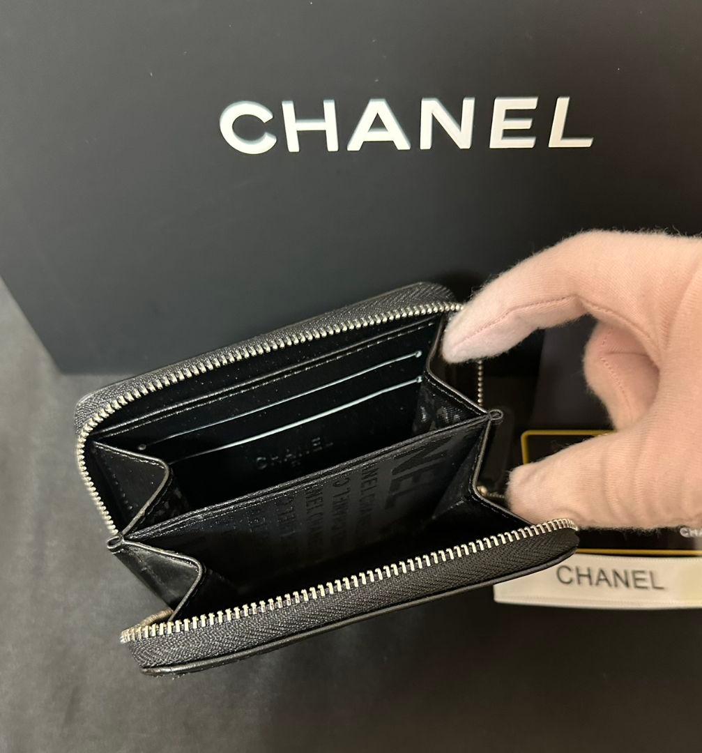 CHANEL ノベルティカメリア柄ミニ財布ケースブラック